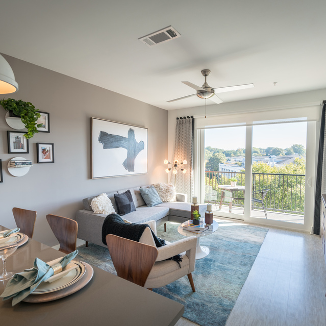 Anthem on Ashley - Carpeted Living Room