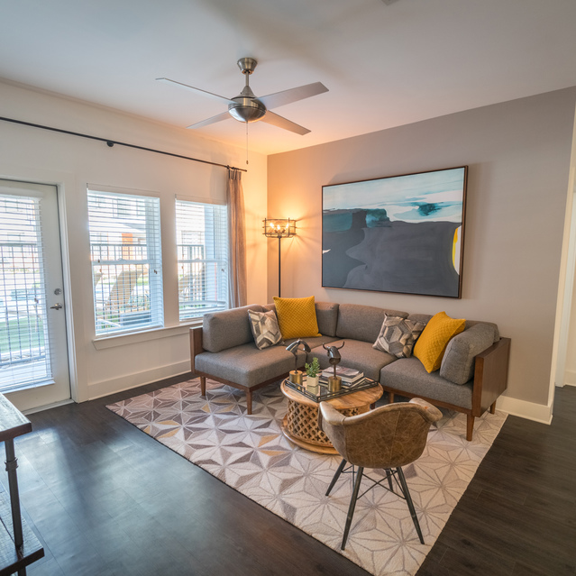 Anthem on Ashley - Carpeted Living Room